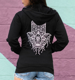 Hamsa Hand detailed design on zip-up hoodie featuring the evil eye and lotus. 